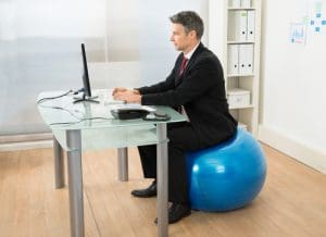 Office Yoga To Ease and Prevent Back Pain